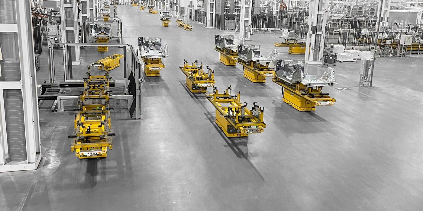 System-integration-of-driverless-transport-systems-AGV-in-the-whole-body-in-white