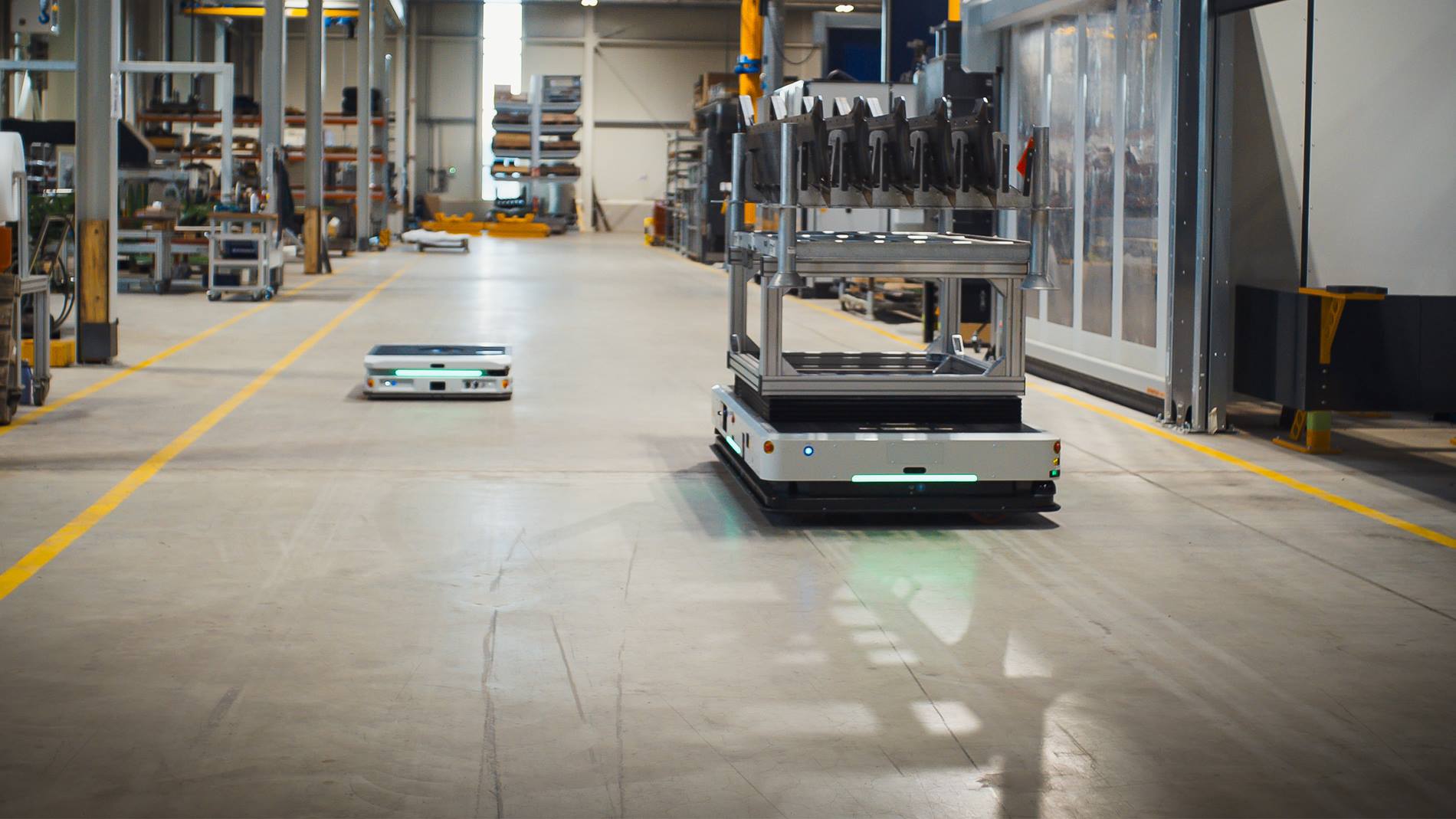 Optimized material flow through autonomous mobile robots